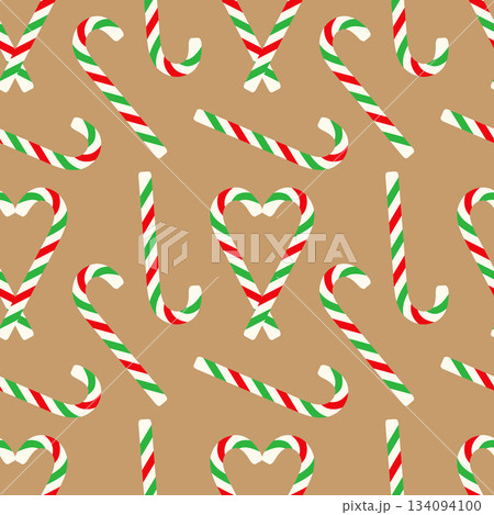 Seamless pattern of Christmas candy canes with green and white stripes on soft brown background. Suitable for holiday packaging, wallpaper, or backdrops. Seamless pattern of Christmas candy canes with green and white stripes on soft brown background. Suitable for holiday packaging, wallpaper, or backdrops. 134094100
