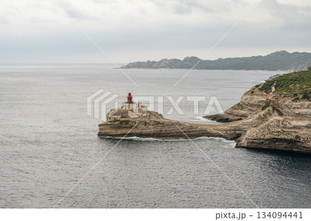 Aerial view marina cape Bonifacio south Corsica France citadel on rocky promontory on wild white limestone cliffs 134094441
