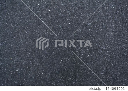 Realistic vector illustration showing rough asphalt surface with small stones and fine cracks 134095991