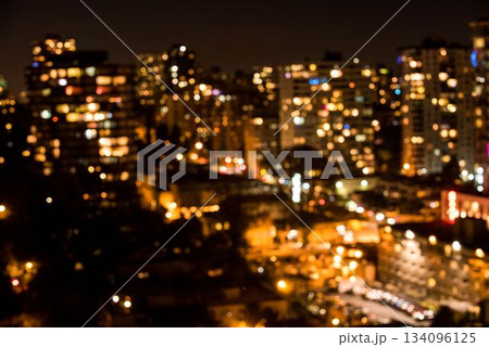 Defocused image of illuminated city at night Defocused image of illuminated city at night 134096125