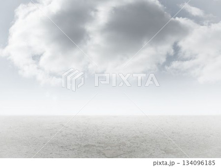 Barren cracked plain is stretching under overcast sky in flat design with massive grey cloud 134096185