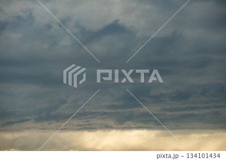 Storm clouds during sunset Storm clouds during sunset 134101434
