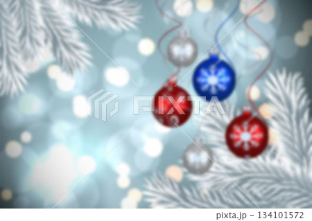 Baubles hanging over christmas scene 134101572