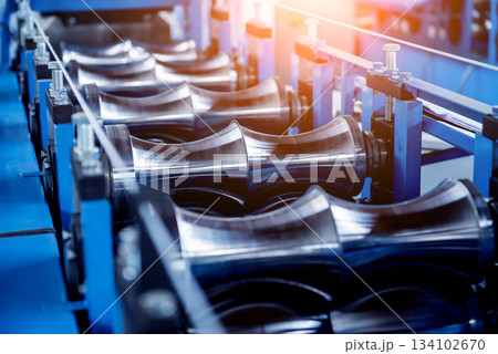 Metal sheet forming machine at the modern metalwork factory. Metal sheet forming machine at the modern metalwork factory. 134102670