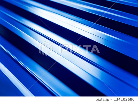 Blue metallic roof tiles background with drops of water. Blue metallic roof tiles background with drops of water. 134102690