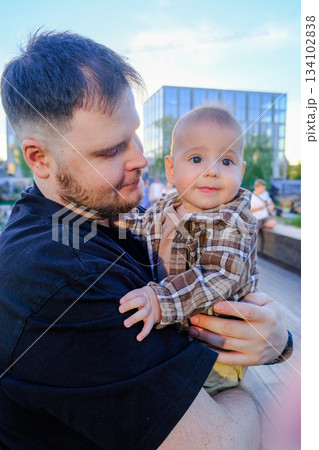 Father and Baby Smiling Outdoors Father and Baby Smiling Outdoors 134102838