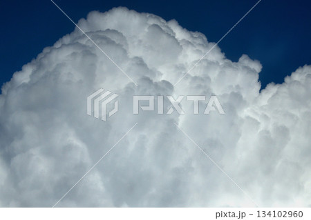 A close-up of a large cumulus cloud 134102960