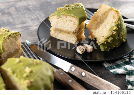 Slice of pistachio cake 134106136