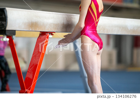Young girl before for balance beam Young girl before for balance beam 134106276