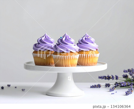 Instagram blogs. Various cupcakes in pastel colors on dessert stand with soft lighting. Instagram blogs. Various cupcakes in pastel colors on dessert stand with soft lighting. 134106364