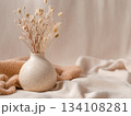 Cozy minimal composition with ceramic vase and dried flowers 134108281