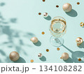 Festive champagne glass on mint background 134108282
