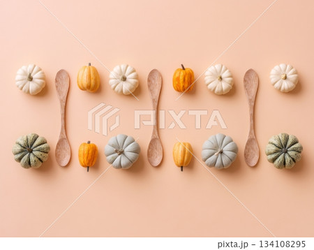 Mini pumpkins and corn on peach background 134108295
