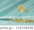 Sparkling drink with lemon and confetti 134108296