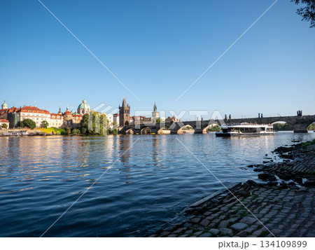The Charles Bridge crossing the Vltava River in Prague, Czech Republic. The Charles Bridge crossing the Vltava River in Prague, Czech Republic. 134109899