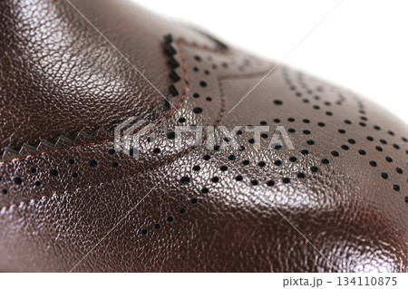 Detailed view of brown leather dress shoe design 134110875