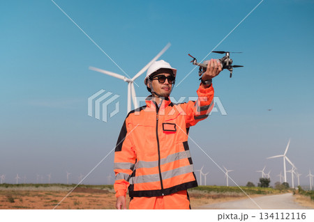 Engineer working at Wind turbine fields Engineer working at Wind turbine fields 134112116