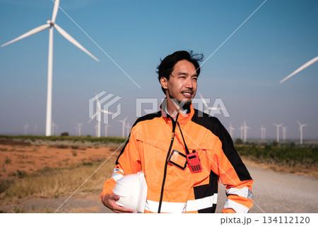 Engineer working at Wind turbine fields Engineer working at Wind turbine fields 134112120