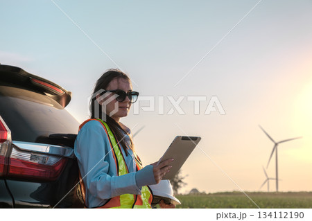 Engineer working at Wind turbine fields Engineer working at Wind turbine fields 134112190