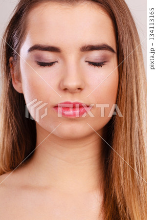 Closeup portrait of young teenager woman. Closeup portrait of young teenager woman. 134113165