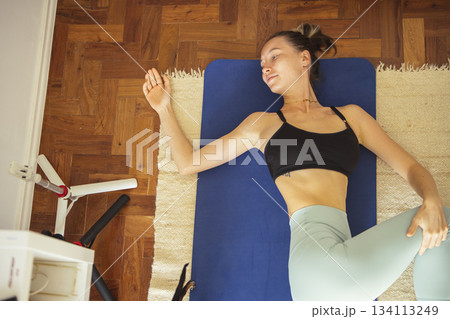 Serene relaxation practice, Calm woman practicing mindful breathing Serene relaxation practice, Calm woman practicing mindful breathing 134113249