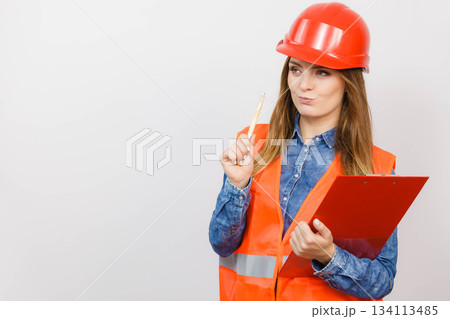 Woman engineer construction builder in helmet. Woman engineer construction builder in helmet. 134113485