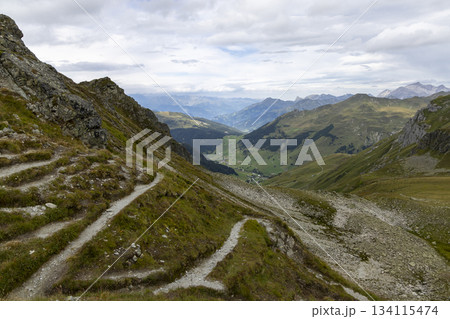 Hiking on Smugglerpfad trail in Gargellen, Montafon, Vorarlberg, Austria with scenic mountains and valleys around Hiking on Smugglerpfad trail in Gargellen, Montafon, Vorarlberg, Austria with scenic mountains and valleys around 134115474