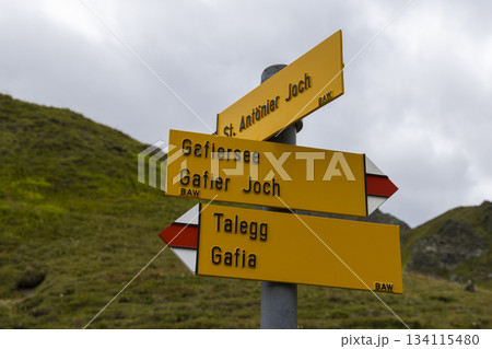 Hiking sign displays trail directions at Smugglerpfad in Gargellen, Montafon, Vorarlberg, Austria Hiking sign displays trail directions at Smugglerpfad in Gargellen, Montafon, Vorarlberg, Austria 134115480