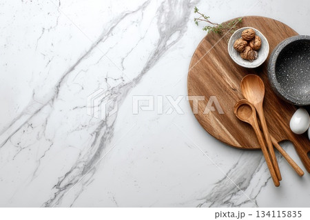 Elegant Food Photography Wooden Utensils, Marble, and Bowls 134115835