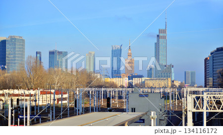 Warsaw, Poland. 28 November 2025. A panorama of the city with skyscrapers. In the foreground are high-voltage cables for electric trains at Warszawa Zachodnia station. Warsaw, Poland. 28 November 2025. A panorama of the city with skyscrapers. In the foreground are high-voltage cables for electric trains at Warszawa Zachodnia station. 134116172