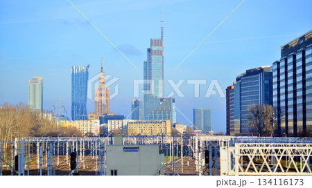 Warsaw, Poland. 28 November 2025. A panorama of the city with skyscrapers. In the foreground are high-voltage cables for electric trains at Warszawa Zachodnia station. 134116173