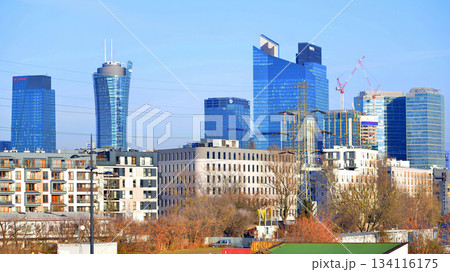Warsaw, Poland. 28 November 2025. A panorama of the city with skyscrapers. In the foreground are high-voltage cables for electric trains at Warszawa Zachodnia station. 134116175