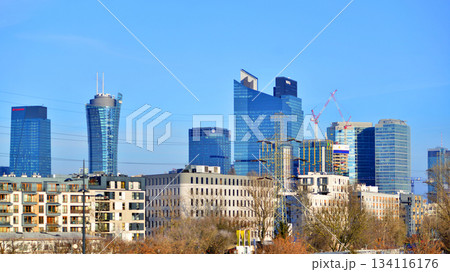 Warsaw, Poland. 28 November 2025. A panorama of the city with skyscrapers. In the foreground are high-voltage cables for electric trains at Warszawa Zachodnia station. 134116176