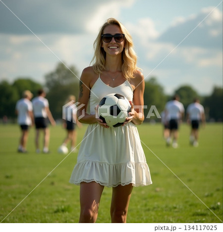 Smiling woman holding a soccer ball on a sunny day Generative AI 134117025