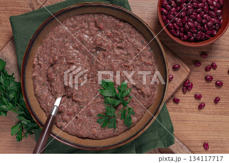 Red bean lobio,a traditional Georgian dish, on a wooden table, homemade, Red bean lobio,a traditional Georgian dish, on a wooden table, homemade, 134117717
