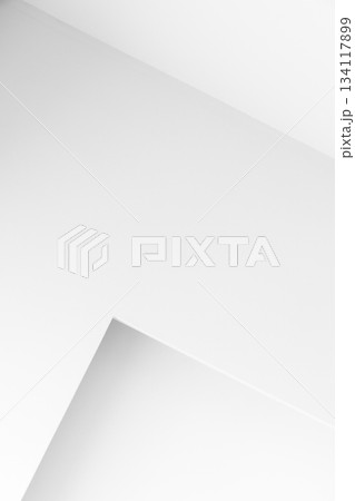 A serene, vertical high-key minimalist image featuring clean white planes 134117899