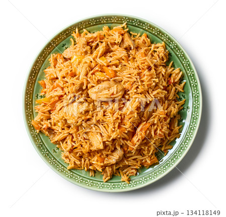 rice with chicken meat and vegetables on green plate 134118149