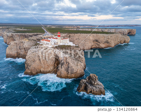 Cape Saint Vincent, Lighthouse and Atlantic Ocean in Evening. Aerial View. Algarve, Portugal Cape Saint Vincent, Lighthouse and Atlantic Ocean in Evening. Aerial View. Algarve, Portugal 134120864