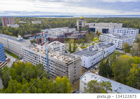 Aerial view of Novosibirsk State University, forests, Ob river and construction of new buildings 134122873