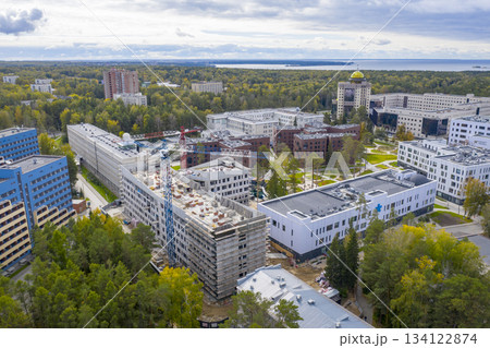 Aerial view of Novosibirsk State University, forests, Ob river and construction of new buildings 134122874