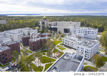 Aerial view of Novosibirsk State University among forests in autumn, and the Ob river on horizon 134122876