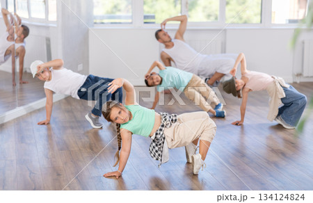 Group of children dancers having break dance training at dance studio 134124824