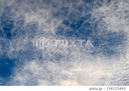 The intricate and beautiful cloud patterns in the sky above are truly mesmerizing The intricate and beautiful cloud patterns in the sky above are truly mesmerizing 134125443