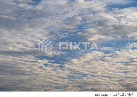 A Beautifully Cloudy Sky Displaying a Variety of Textures and Shades Throughout the Day 134125464