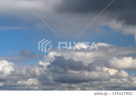 A Stunning Dynamic Cloudscape Set Against a Beautiful and Expansive Blue Sky, Perfectly 134127402