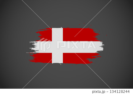 Denmark National Flag Grunge Brush Stroke Graphic: Artistic Dannebrog Banner on Dark Background. Denmark National Flag Grunge Brush Stroke Graphic: Artistic Dannebrog Banner on Dark Background. 134128244