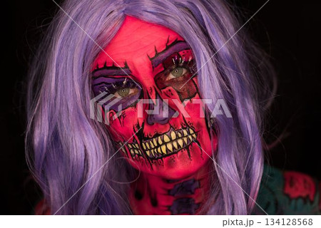 Attractive young woman with Halloween makeup 134128568