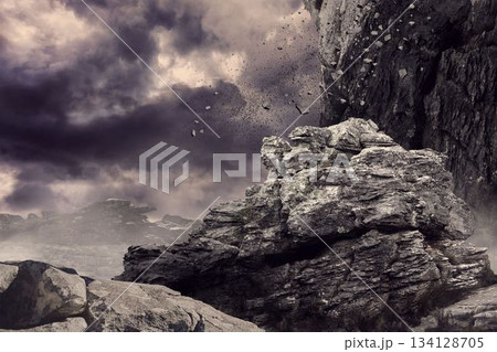 Rock crashing down from cliff Rock crashing down from cliff 134128705