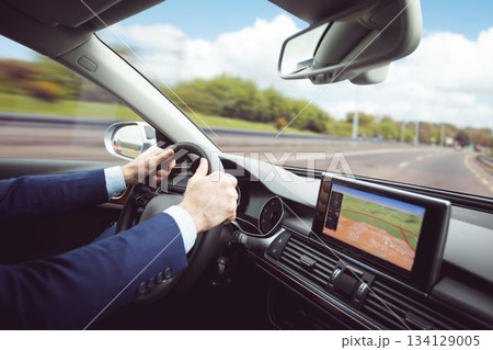 Side view of steering wheel and navigation system Side view of steering wheel and navigation system 134129005