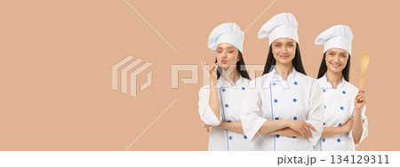 Woman in chef outfit in different poses, space for text Woman in chef outfit in different poses, space for text 134129311